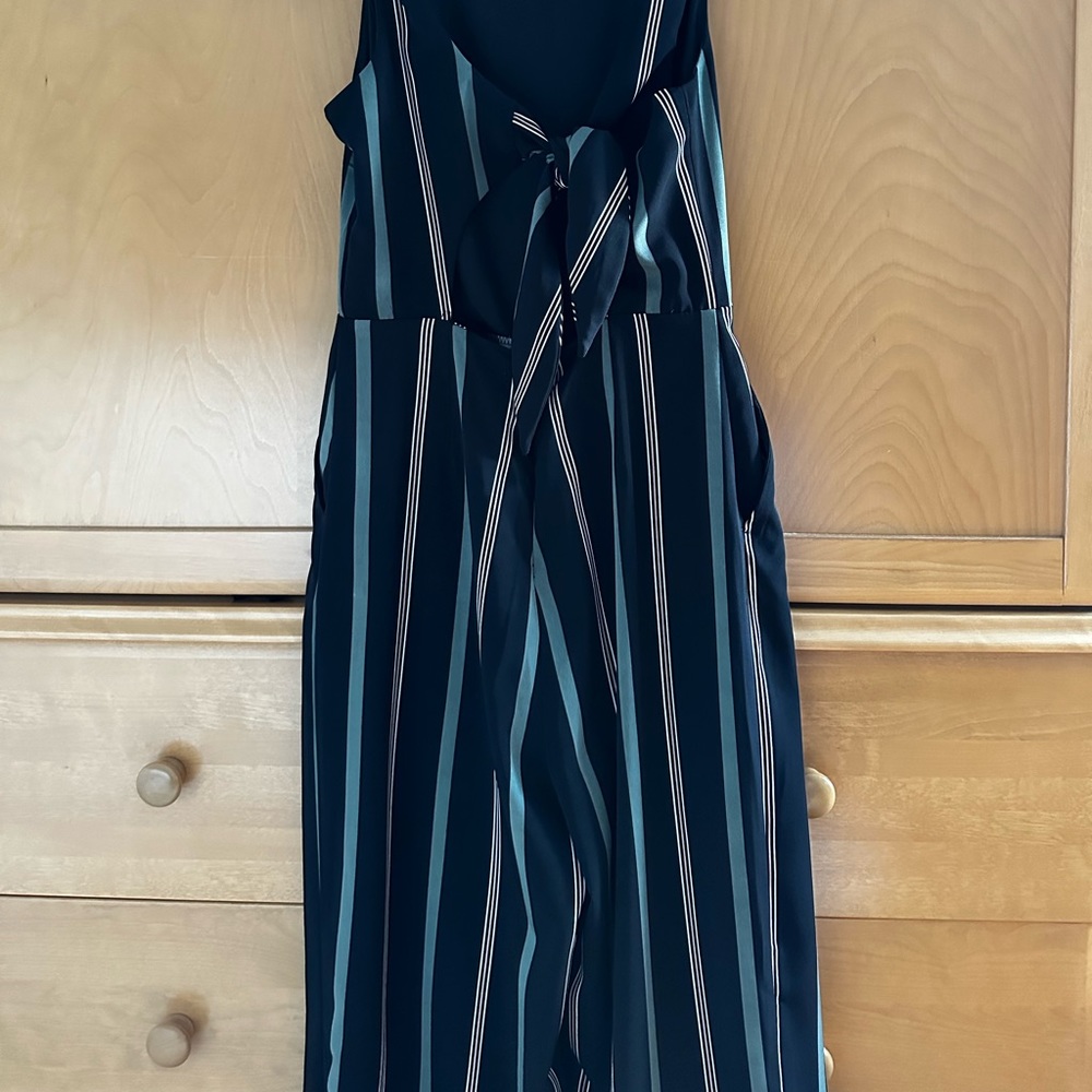 Dynamite tank top jumpsuit. Only work once. Great condition.